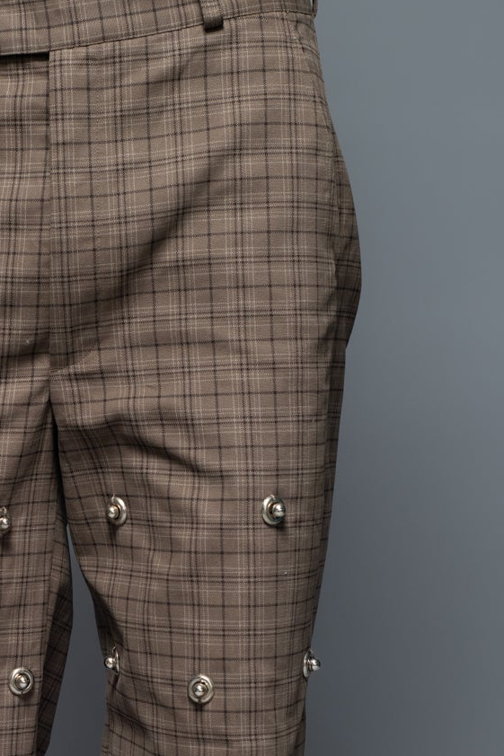 ROSANI The Katu trouser in brown check - relaxed-fit checked trousers with metallic inserts and applique back pockets, front view