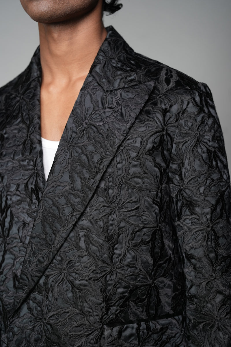 ROSANI The Lumen blazer in black - textured jacquard blazer styled with matching trousers, detail view