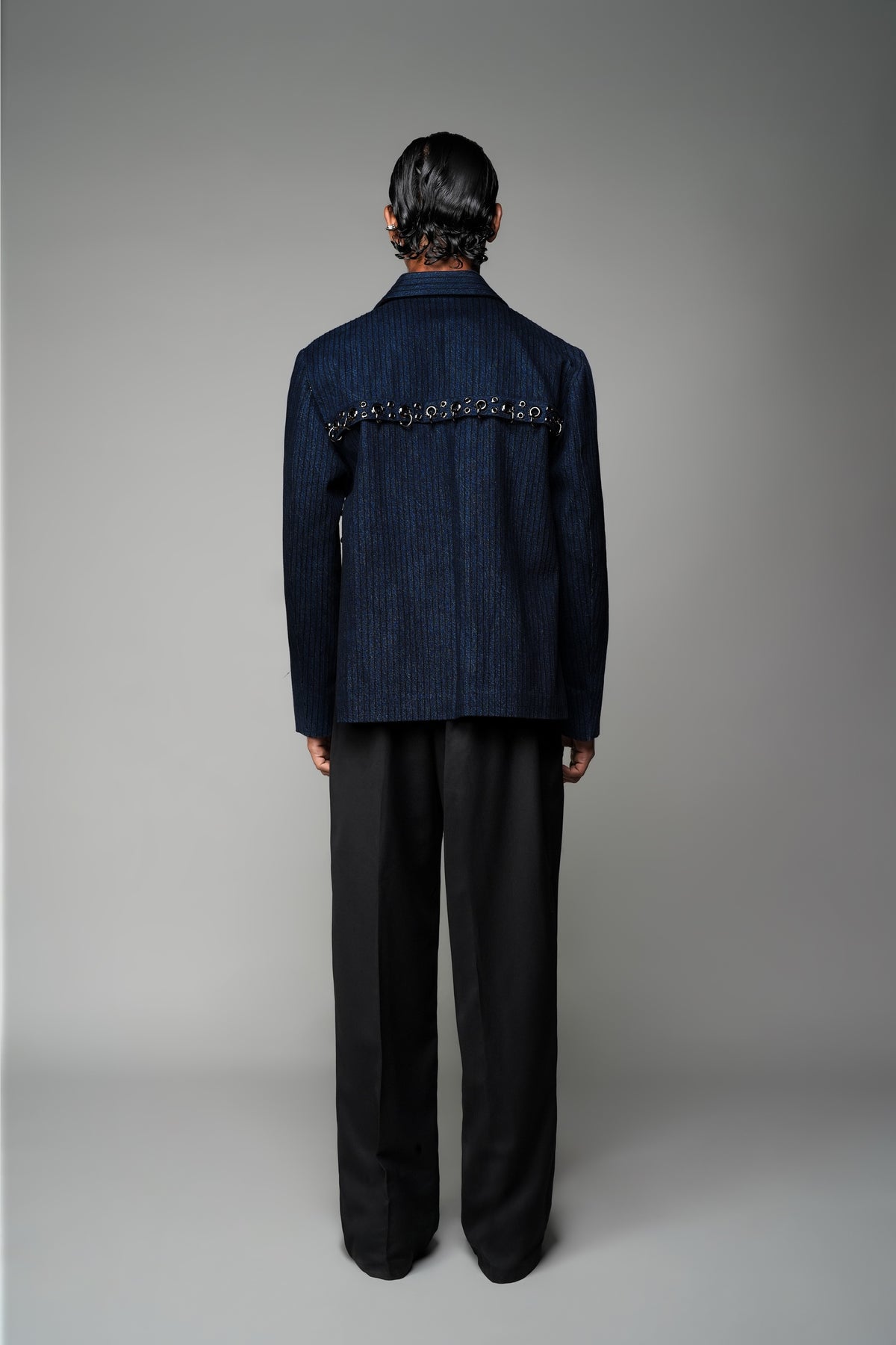 ROSANI The Noema jacket in midnight denim - anchor-thread embroidered jacket with metal ring detail, back view