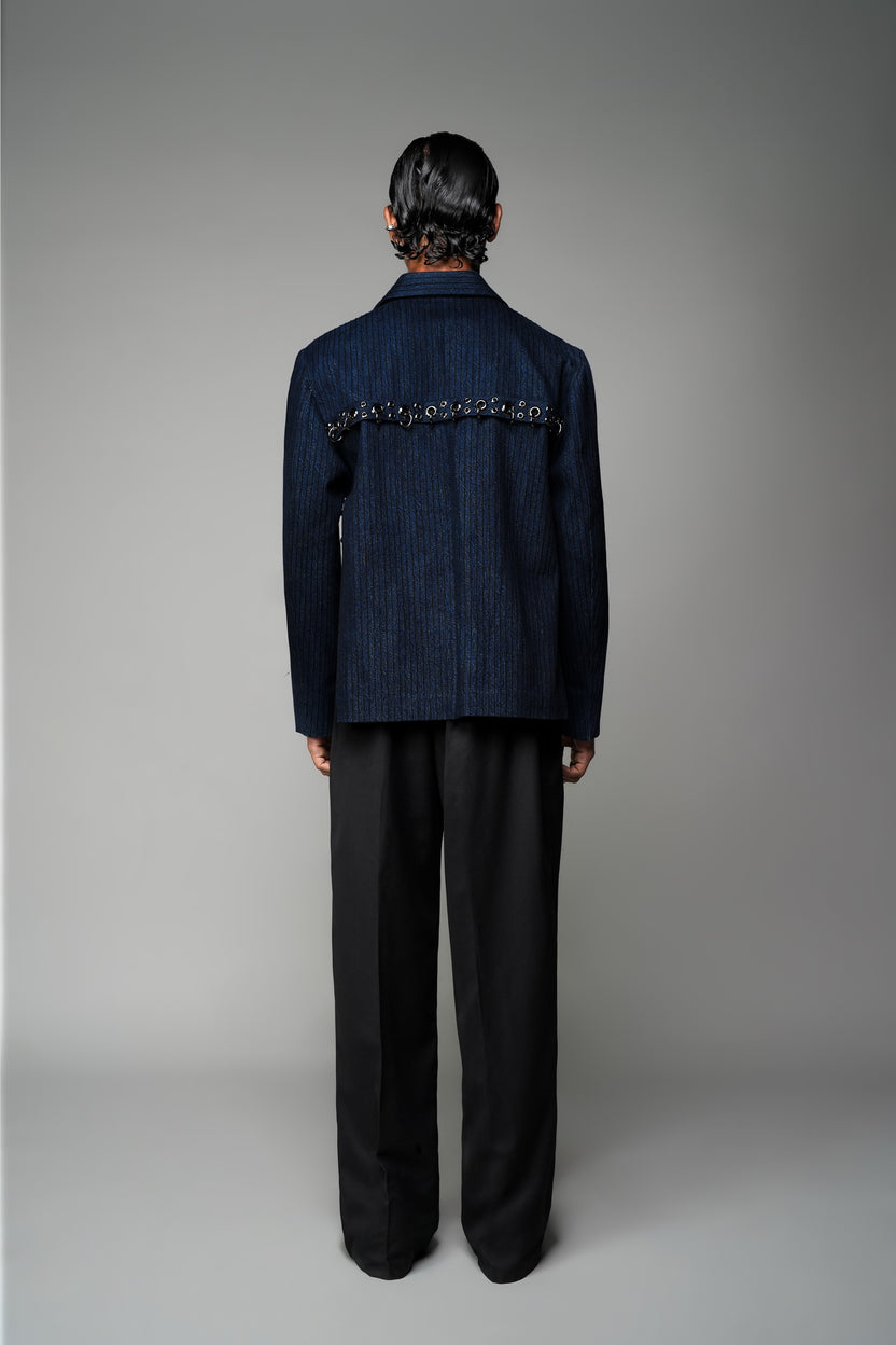ROSANI The Noema jacket in midnight denim - anchor-thread embroidered jacket with metal ring detail, back view