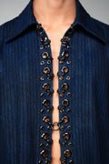 ROSANI The Noema jacket in midnight denim - metal ring and eyelet seam, second detail view
