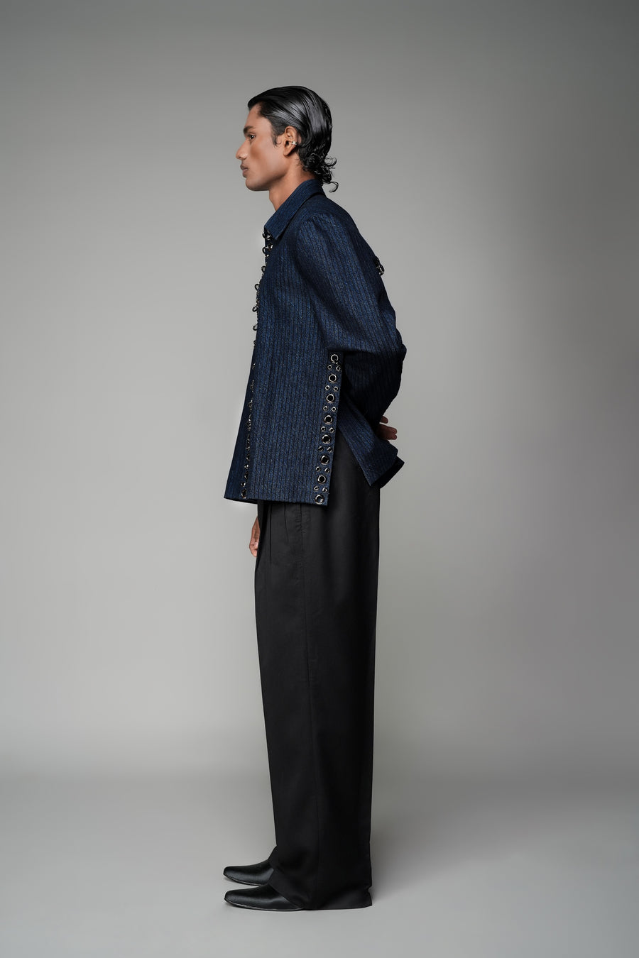 ROSANI The Noema jacket in midnight denim - anchor-thread embroidered jacket with metal ring detail, side view