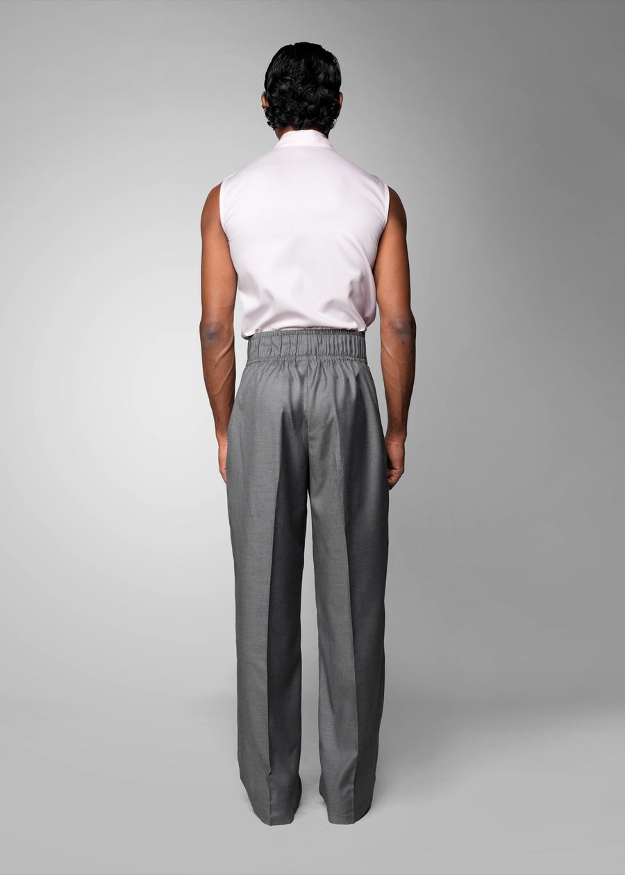 ROSANI The Pulse trouser in grey - high-waisted tailored trousers with front pleats and wide-leg fit, back view with elastic waistband