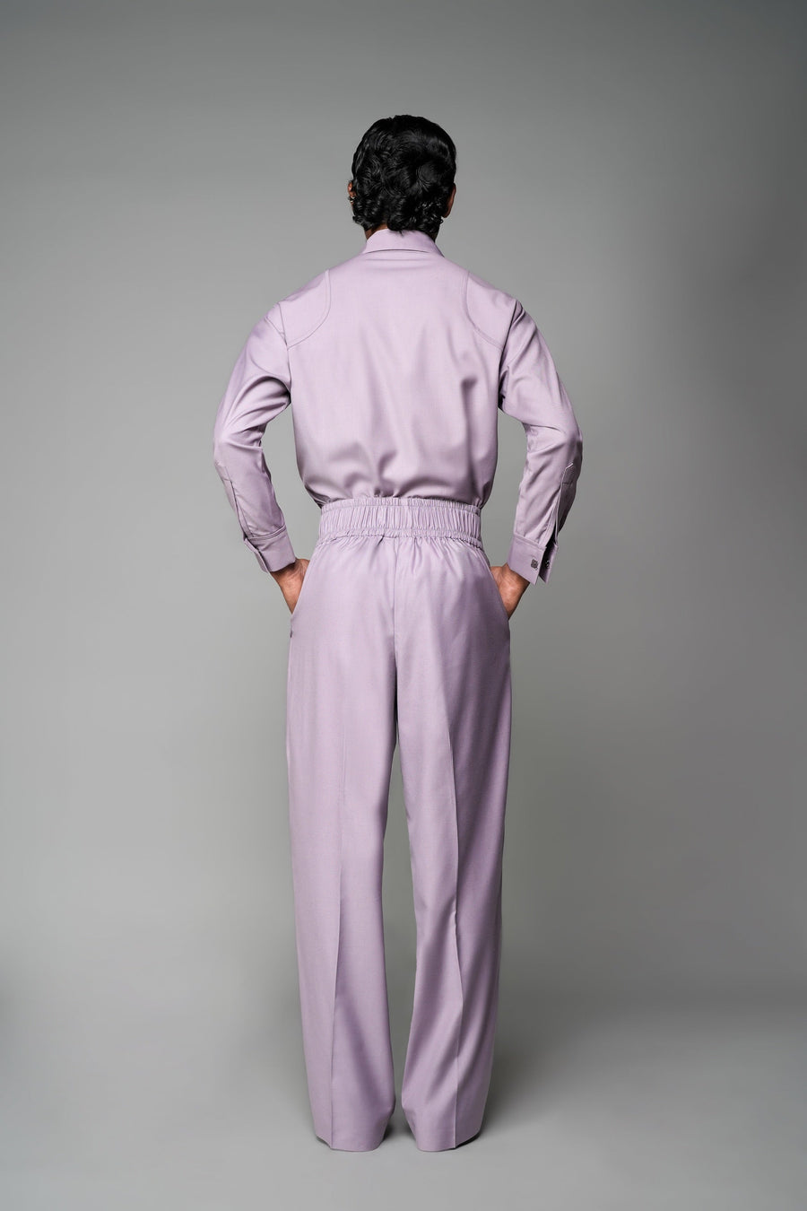 ROSANI The Pulse trouser in wisteria - high-waisted tailored trousers with front pleats and wide-leg fit, back view with elastic waistband