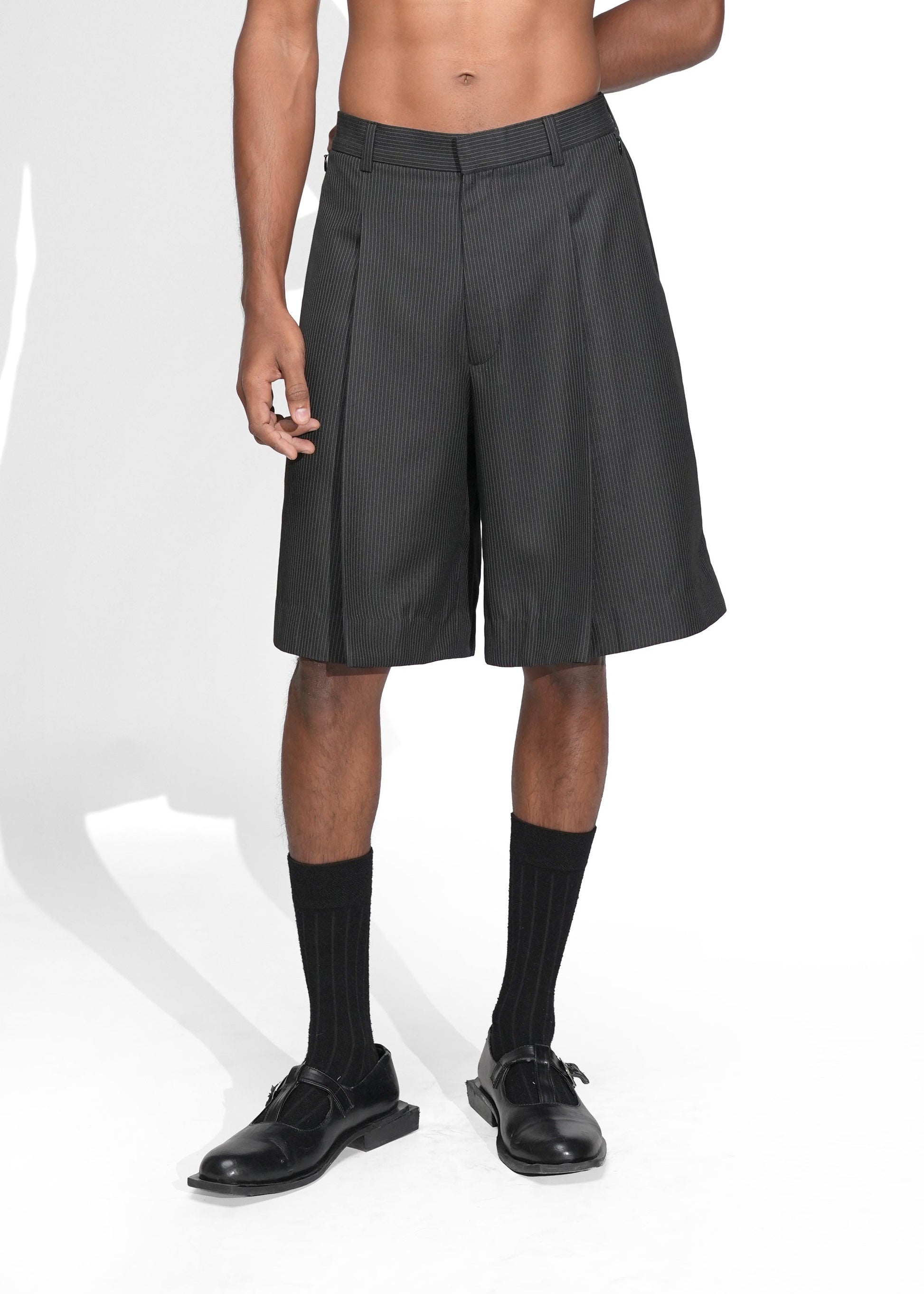 ROSANI The Refuge shorts in pinstripe black - tailored wide-leg shorts with front pleats, front view