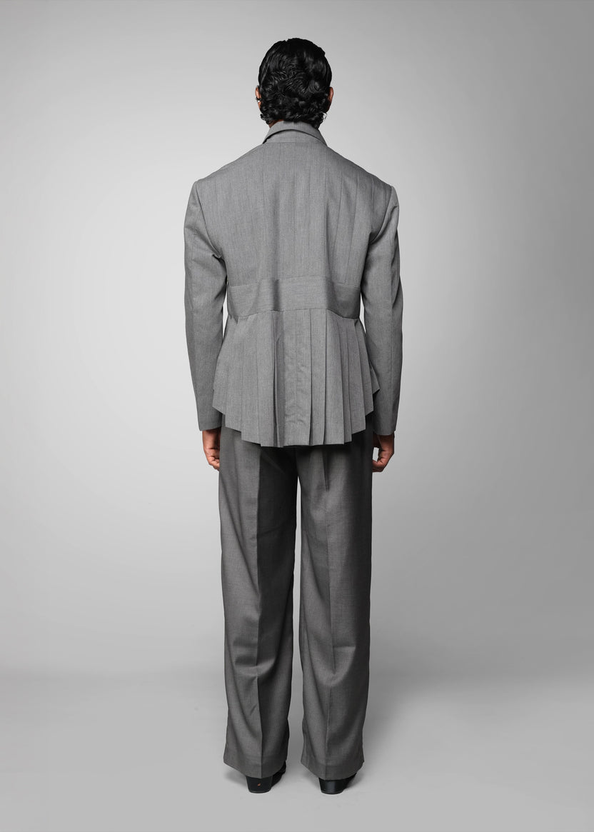 ROSANI The Sanctum jacket in grey - pleated padded blazer with front clasps closure, back view styled with matching trouser