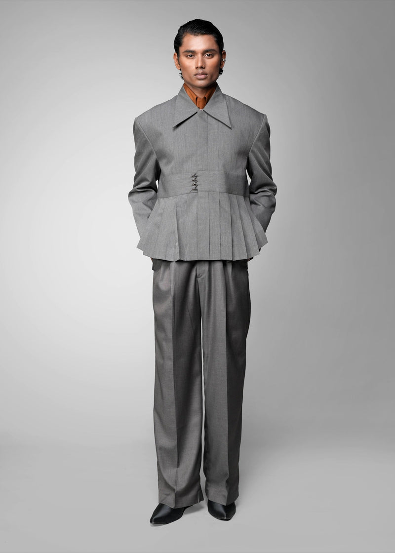 ROSANI The Sanctum jacket in grey - structured tailored jacket with sculpted peplum hem and sharp collar, front view (styled with matching trousers)