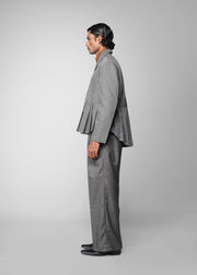 ROSANI The Sanctum jacket in grey - pleated padded blazer with front clasps closure, side view styled with matching trouser