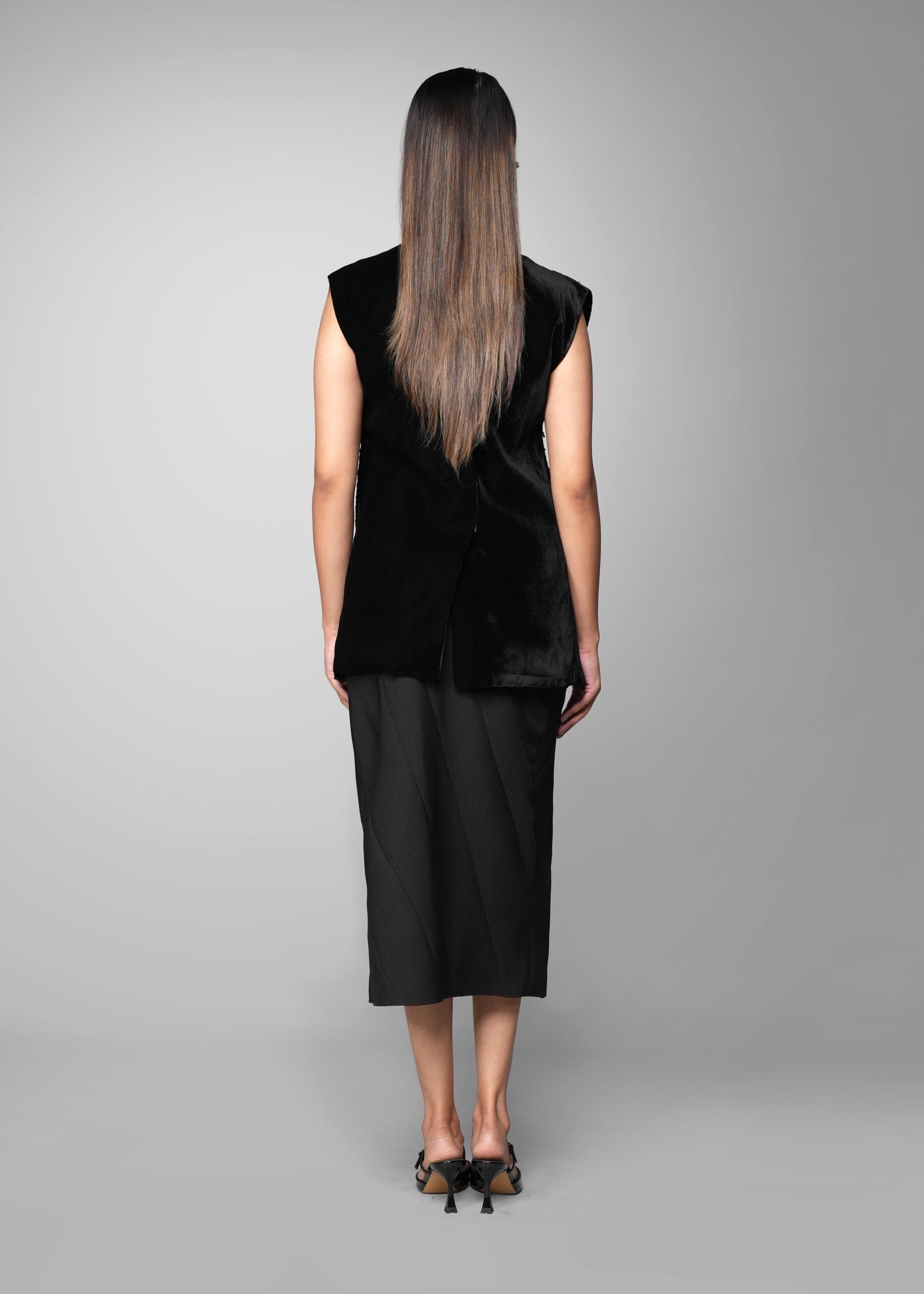 ROSANI The Santuario top in black - sleeveless embellished longline top with vertical metal embroidery stripes, back view