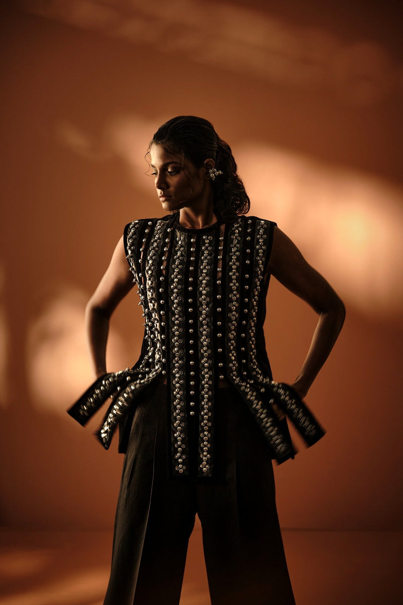 ROSANI The Santuario top in black - sleeveless embellished longline top with vertical metal embroidery stripes, front editorial view