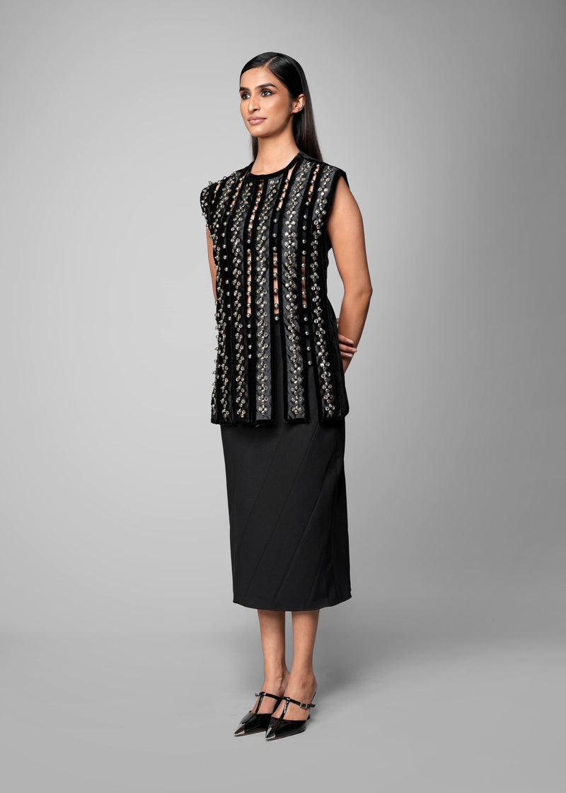 ROSANI The Santuario top in black - sleeveless embellished longline top with vertical metal embroidery stripes, front side view