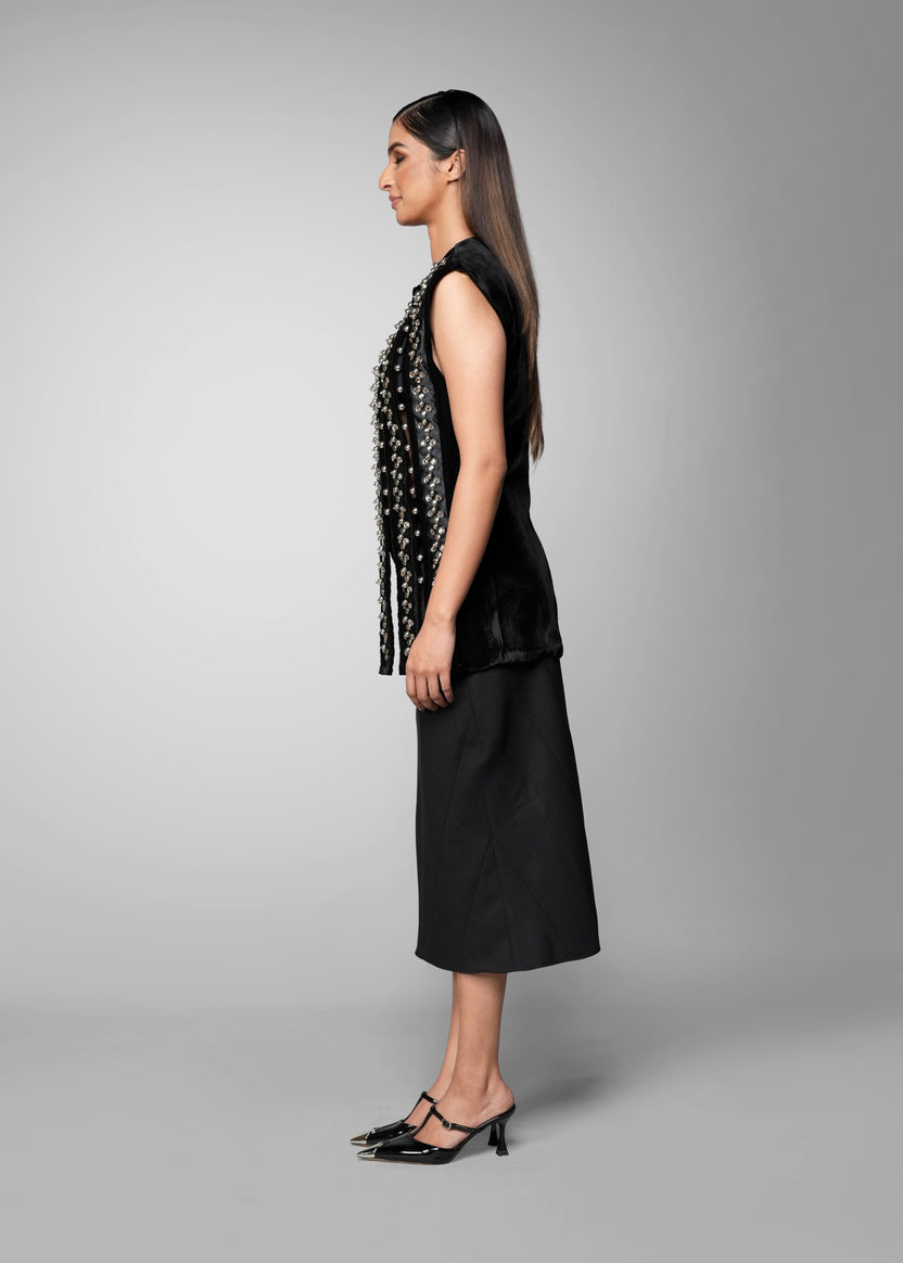 ROSANI The Santuario top in black - sleeveless embellished longline top with vertical metal embroidery stripes, side view