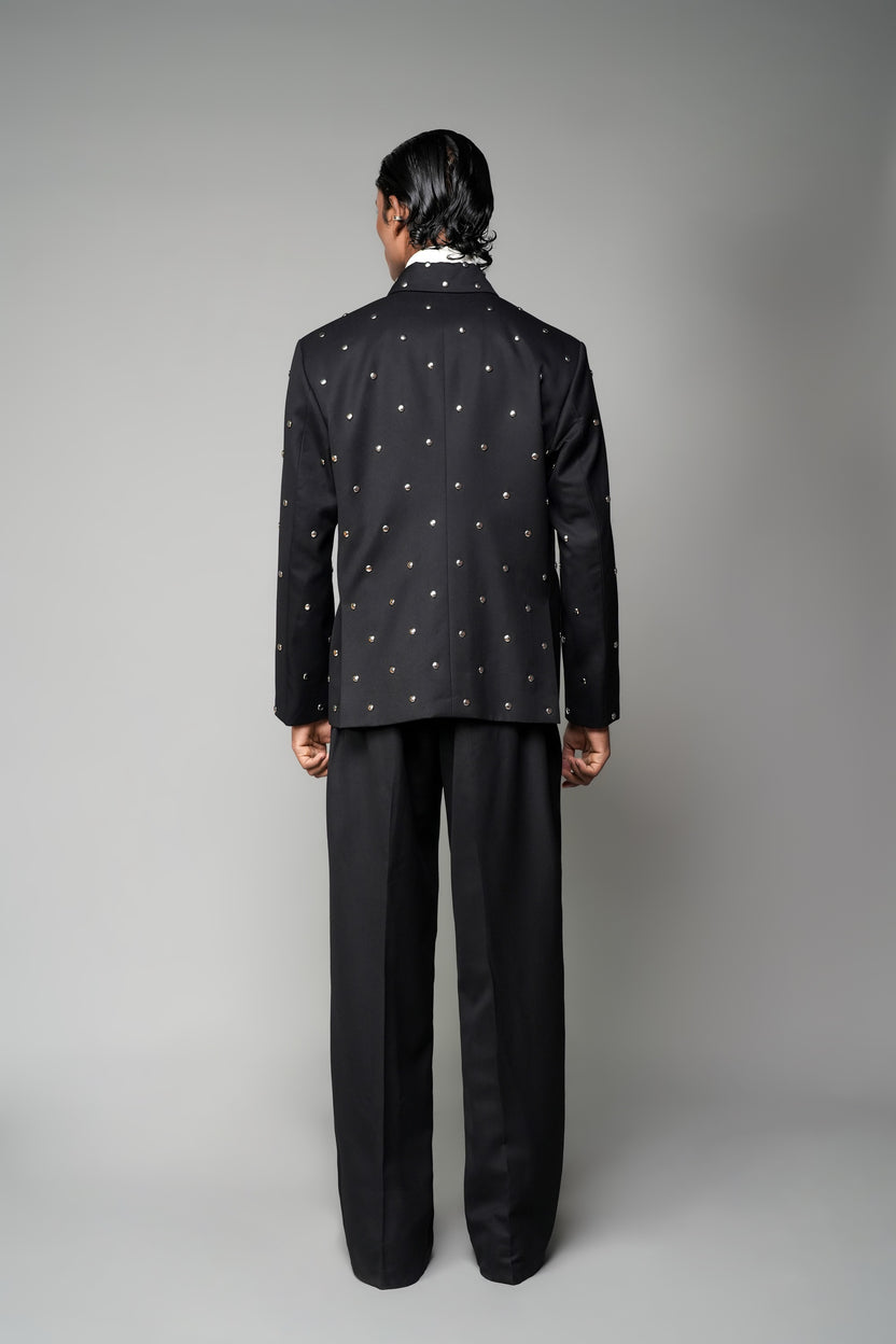 ROSANI The Solum jacket in black - padded blazer with circular metallic embellishment, back view