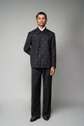 ROSANI The Solum jacket in black - padded blazer with circular metallic embellishment, front view