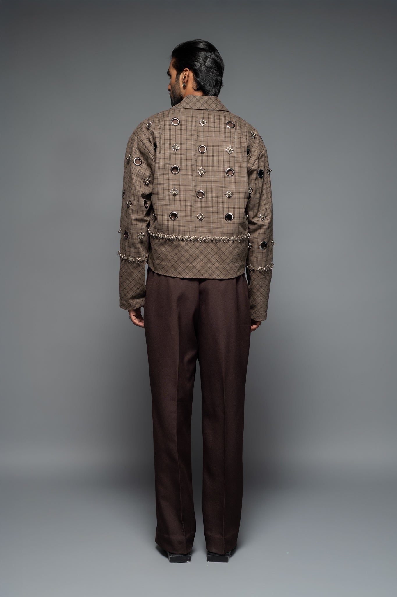 ROSANI The Taratara trouser in chocolate brown - relaxed wide-leg trousers with elastic back waistband, back view, styled with a checked jacket