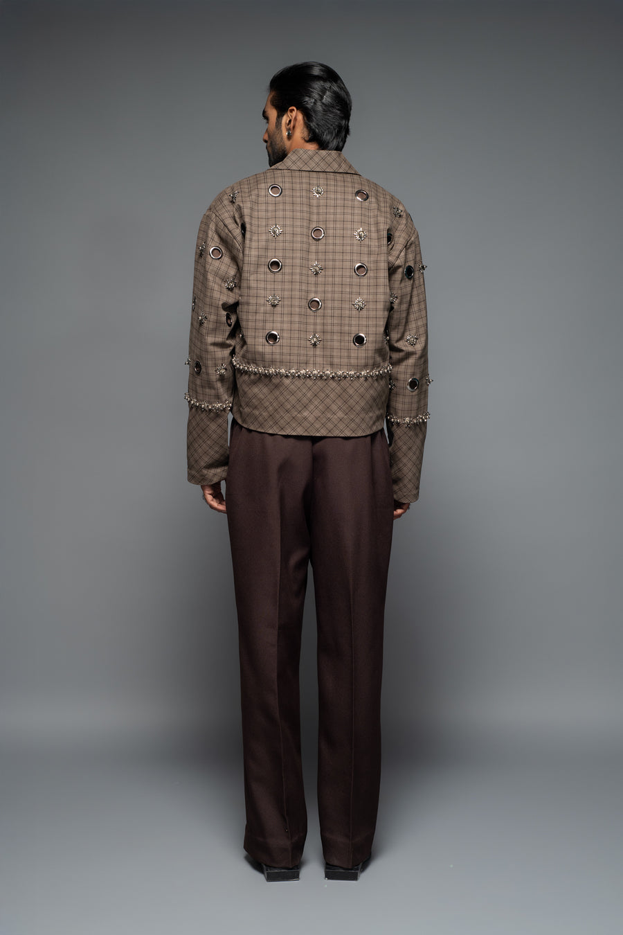 ROSANI The Taratara trouser in chocolate brown - relaxed wide-leg trousers with elastic back waistband, back view, styled with a checked jacket