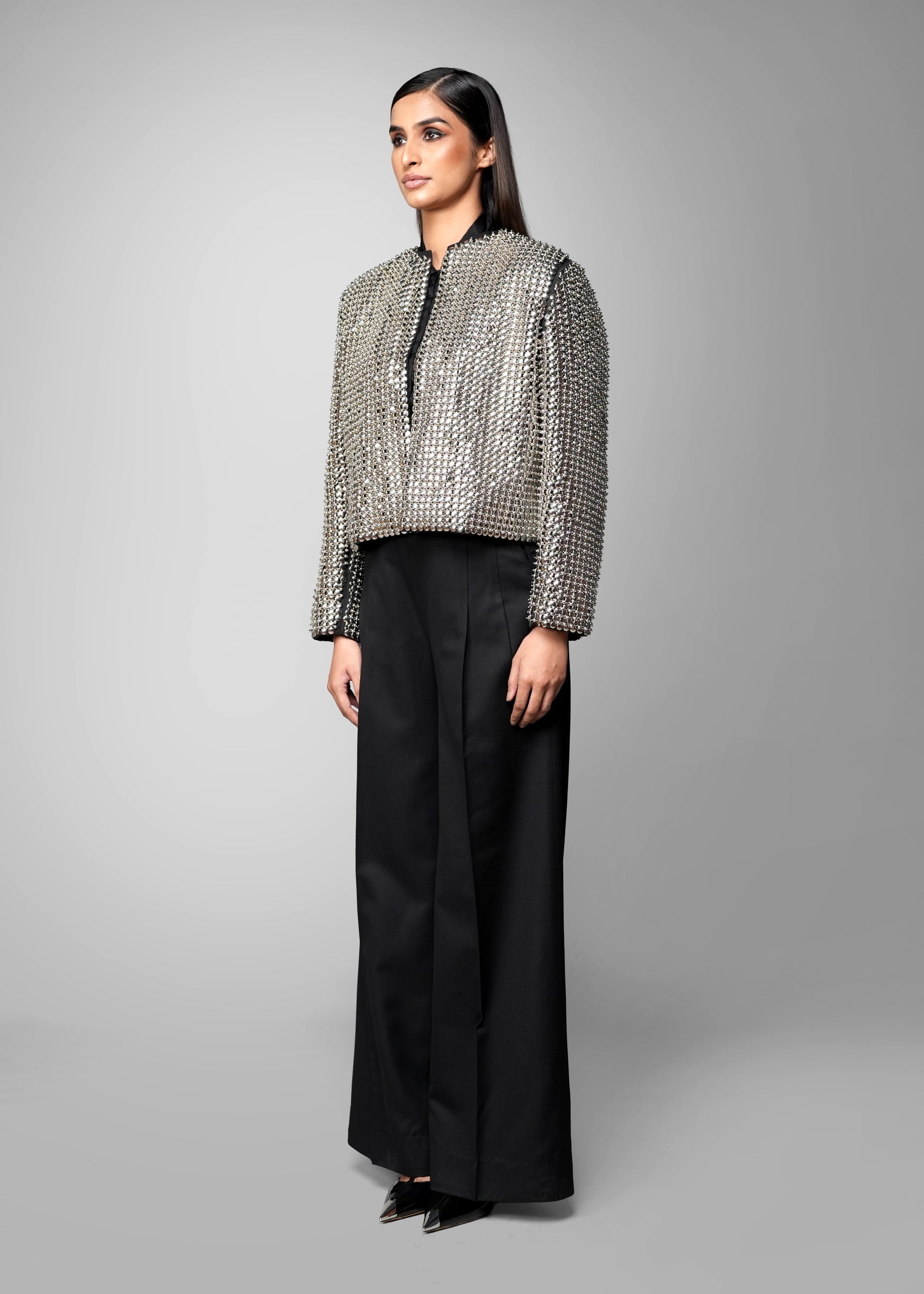 OSANI The Vault jacket - cropped collarless jacket with all-over metallic embellishment, front side view