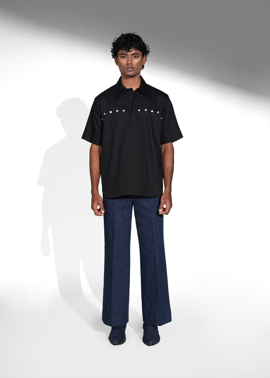 ROSANI The Vaulta shirt in black - half-sleeve cotton shirt with metallic button shoulder joint detail, front view