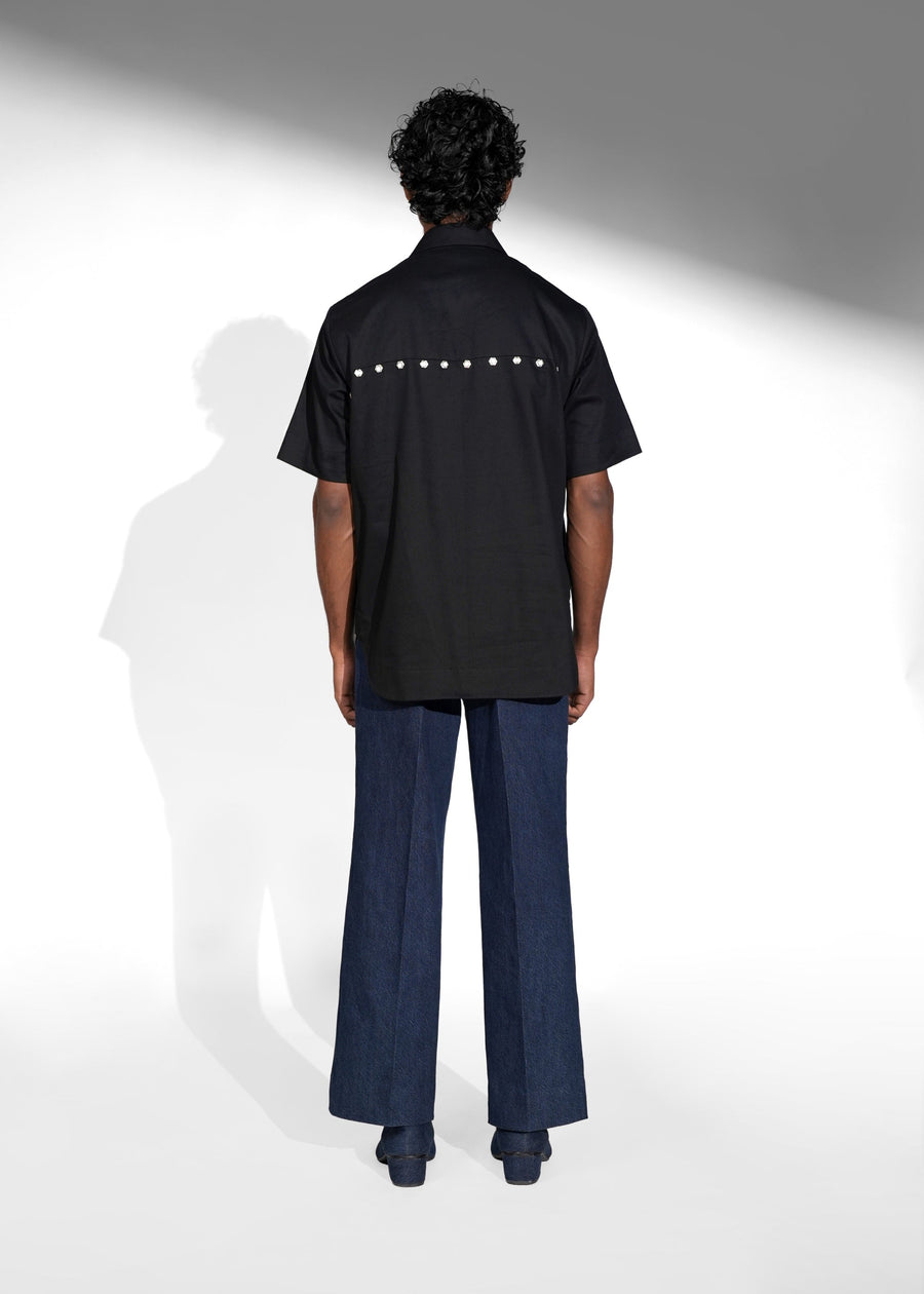ROSANI The Vaulta shirt in black - half-sleeve cotton shirt with metallic button detail, back view