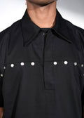 ROSANI The Vaulta shirt in black - metallic button shoulder joint detail, close-up