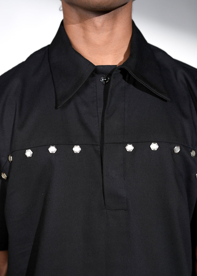 ROSANI The Vaulta shirt in black - metallic button shoulder joint detail, close-up