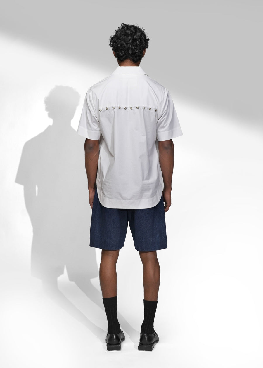 ROSANI The Vaulta shirt in white - half-sleeve cotton shirt with metallic button detail, back view