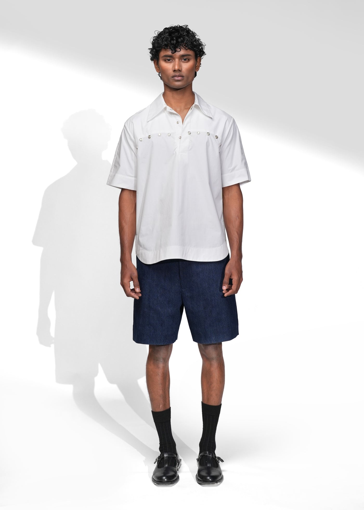 ROSANI The Vaulta shirt in white - half-sleeve cotton shirt with metallic button shoulder joint detail, front view