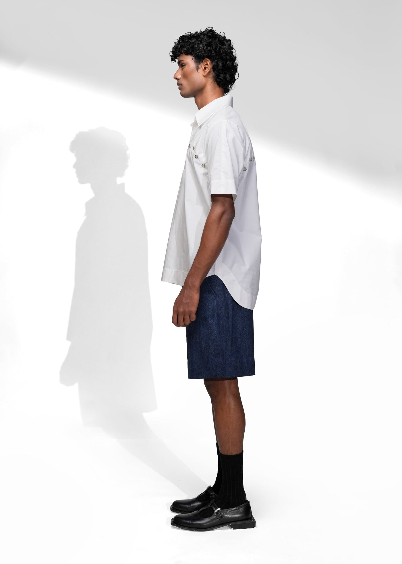 ROSANI The Vaulta shirt in white - half-sleeve cotton shirt with metallic button detail, side view