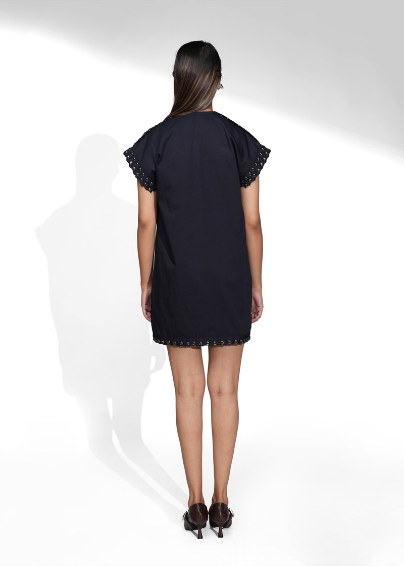 ROSANI The Vestura dress in navy blue - relaxed shift mini dress with embellished sleeve and hem detail, back view