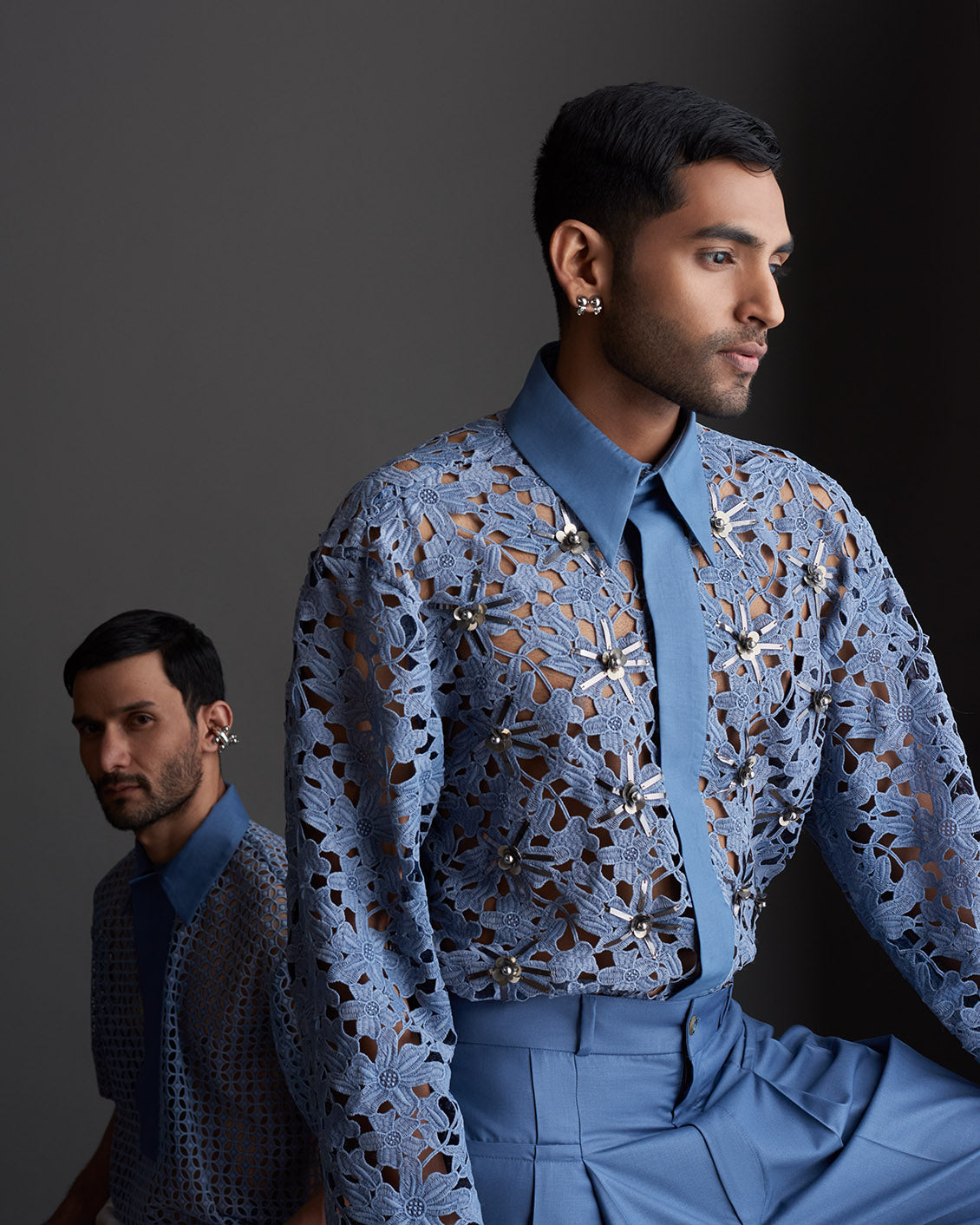ROSANI The Ariel shirt in blue - floral lace shirt with crystal embellishments, styled with tailored trousers and tie, campaign image from ANIMA & ANIMUS