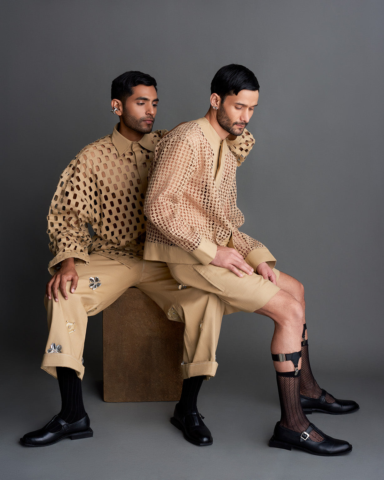 ROSANI The Ellis shirt and The Jaden shirt in beige - two models in matching laser-cut shirts and tailored separates, campaign image from ANIMA & ANIMUS