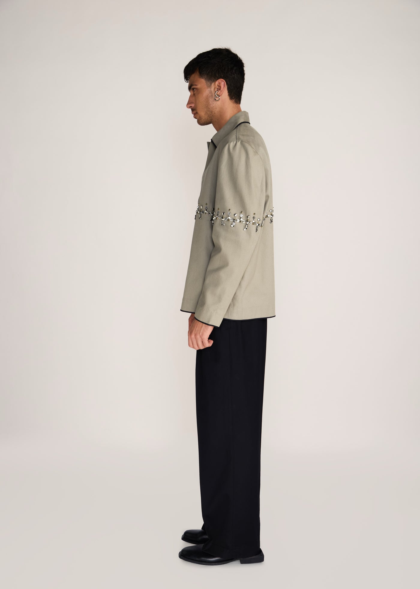 ROSANI The Accordo jacket in deep olive - deep olive cotton jacket with contrast piping and metallic centre detail, side view