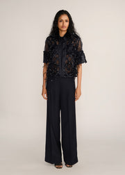 ROSANI The Aether vest in obsidian - obsidian hand-woven strip vest with botanical metallic embroidery, front view