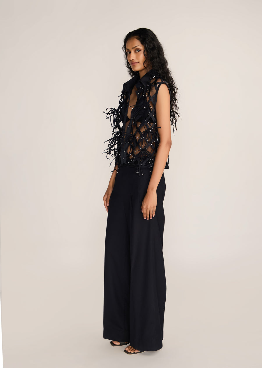 ROSANI The Aether vest in obsidian - obsidian hand-woven strip vest with botanical metallic embroidery, side view