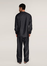 ROSANI The Aligne trouser in charcoal - charcoal press-button embroidered suiting trouser, back view, alternate angle