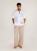 ROSANI The Chōwa shirt in white - white poplin shirt with hand-embroidered raw-edge petals, front view, alternate angle