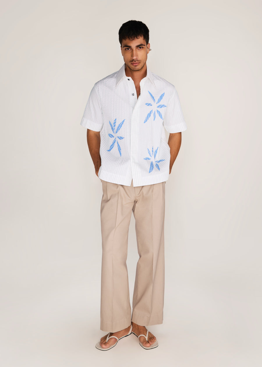 ROSANI The Chōwa shirt in white - white poplin shirt with hand-embroidered raw-edge petals, front view, alternate angle