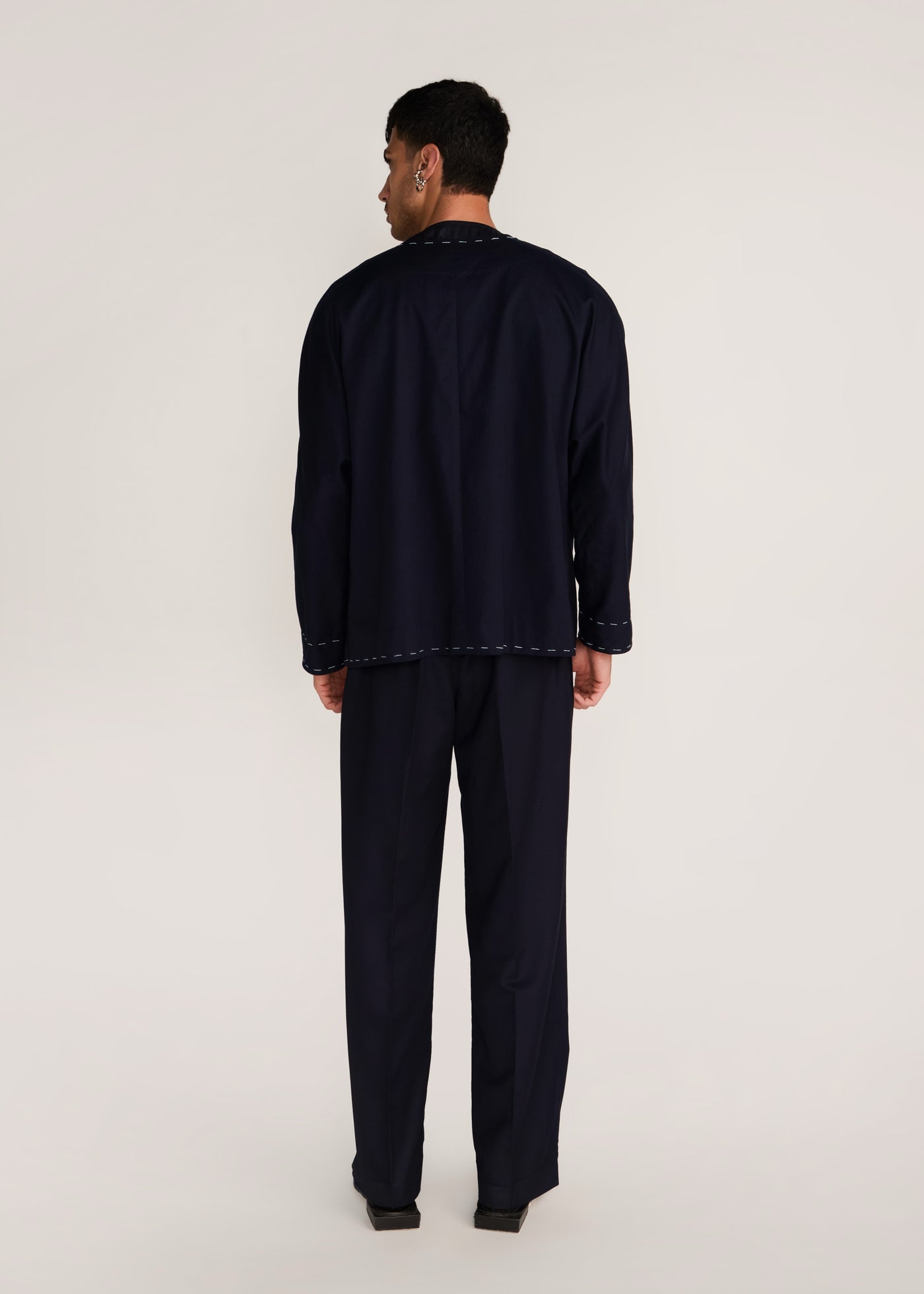 ROSANI The Cohors shacket in black - black cotton shacket with metallic botanical embroidery, back view