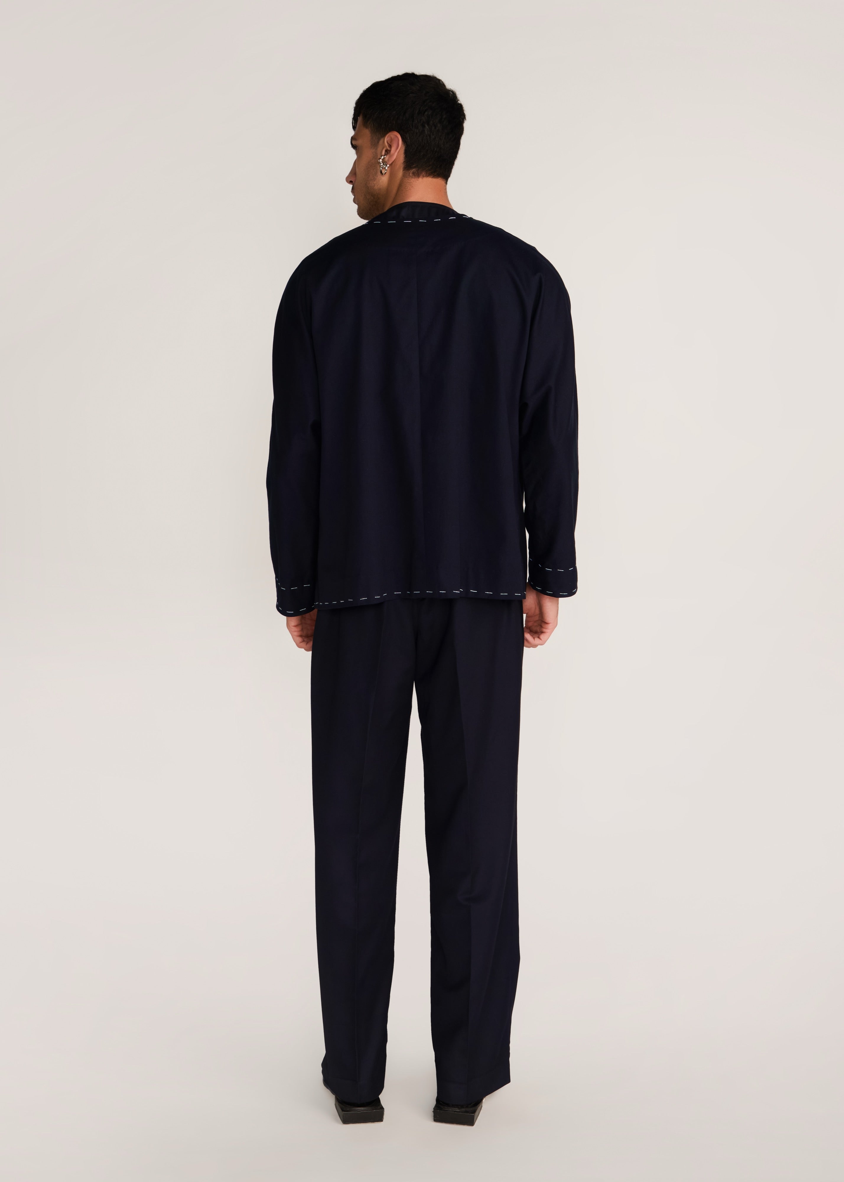 ROSANI The Cohors shacket in black - black cotton shacket with metallic botanical embroidery, back view