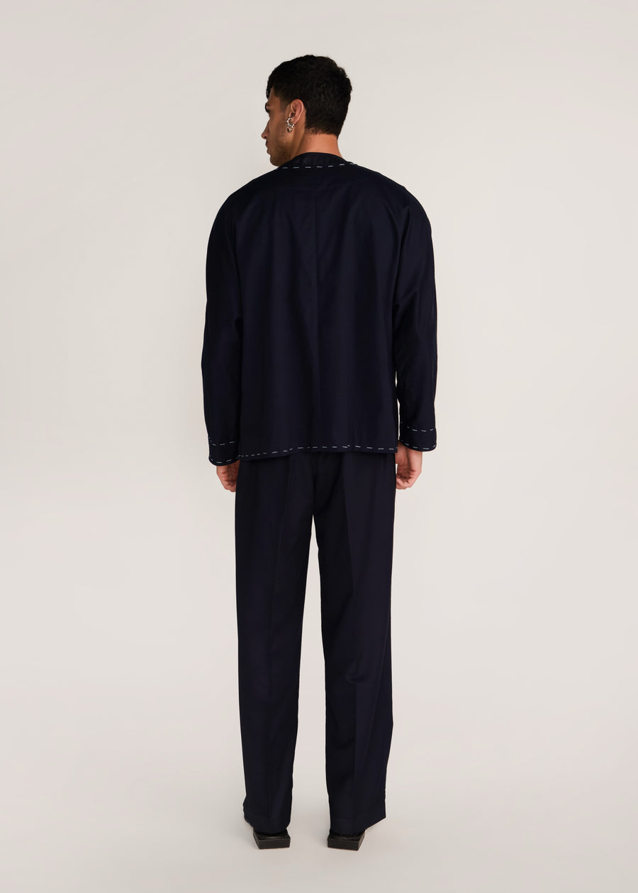 ROSANI The Cohors shacket in black - black cotton shacket with metallic botanical embroidery, back view