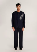 ROSANI The Cohors shacket in black - black cotton shacket with metallic botanical embroidery, front view