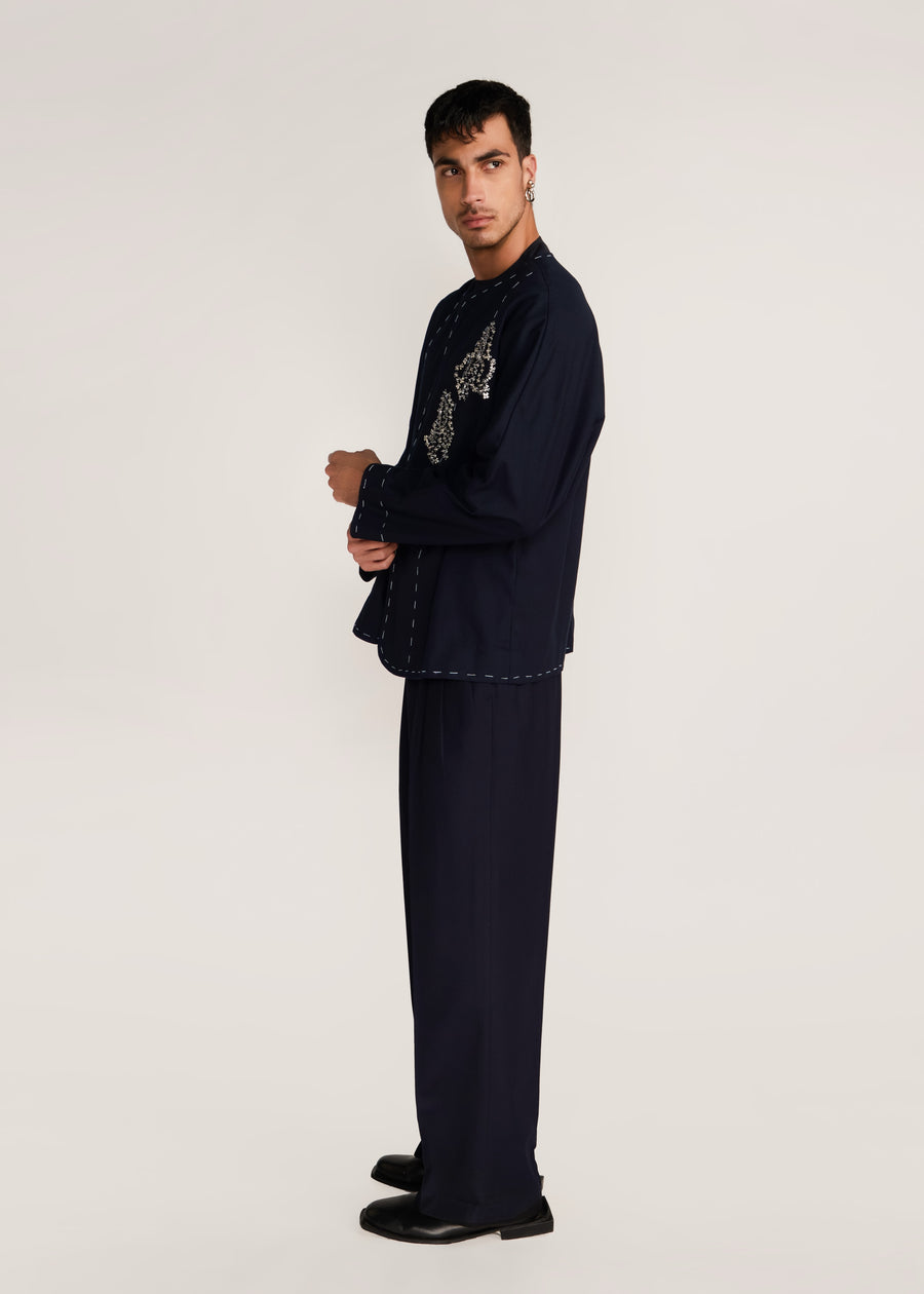 ROSANI The Cohors shacket in black - black cotton shacket with metallic botanical embroidery, side view