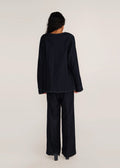 ROSANI The Cohors shacket in black - black cotton shacket with metallic botanical embroidery, back view