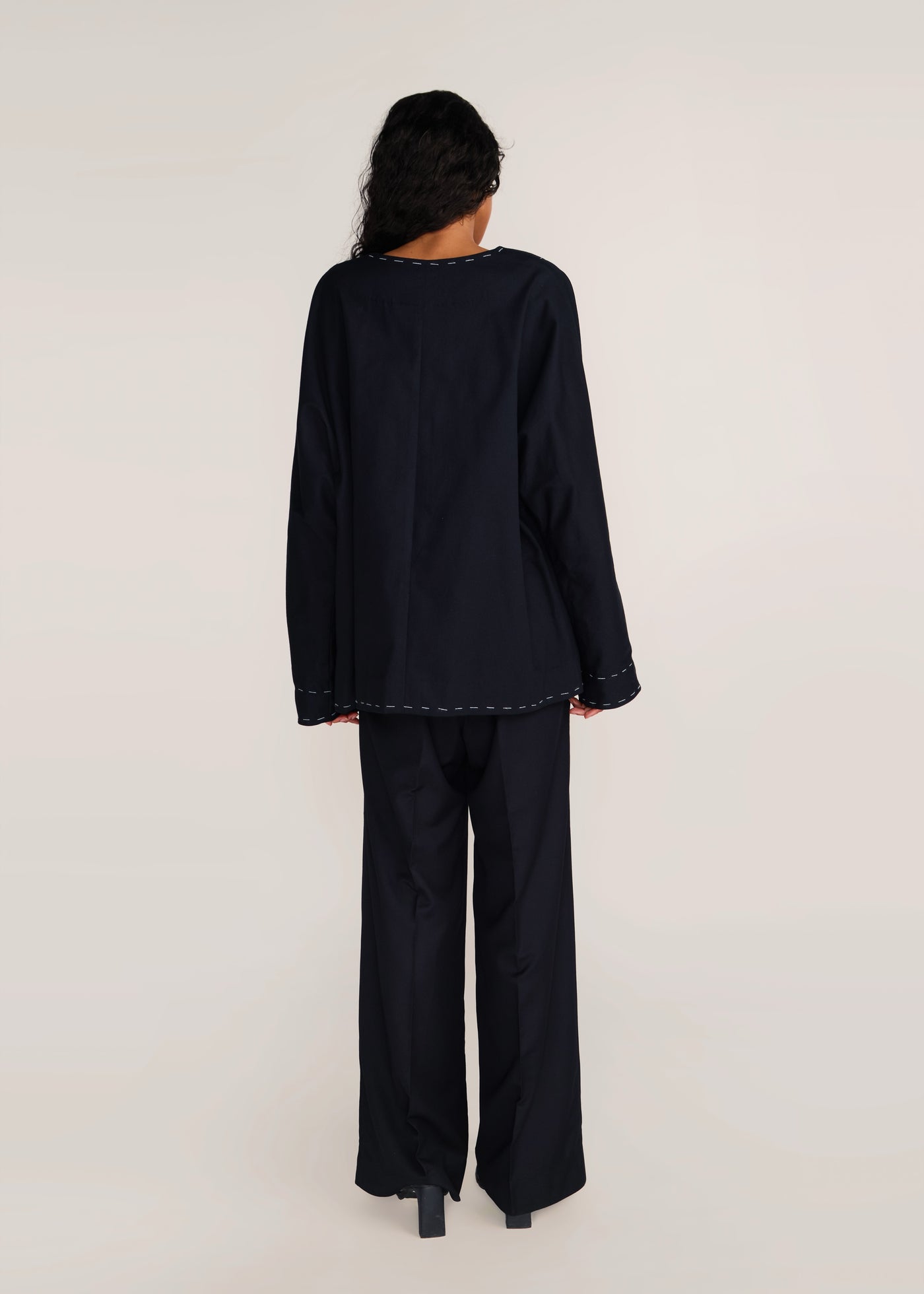 ROSANI The Cohors shacket in black - black cotton shacket with metallic botanical embroidery, back view