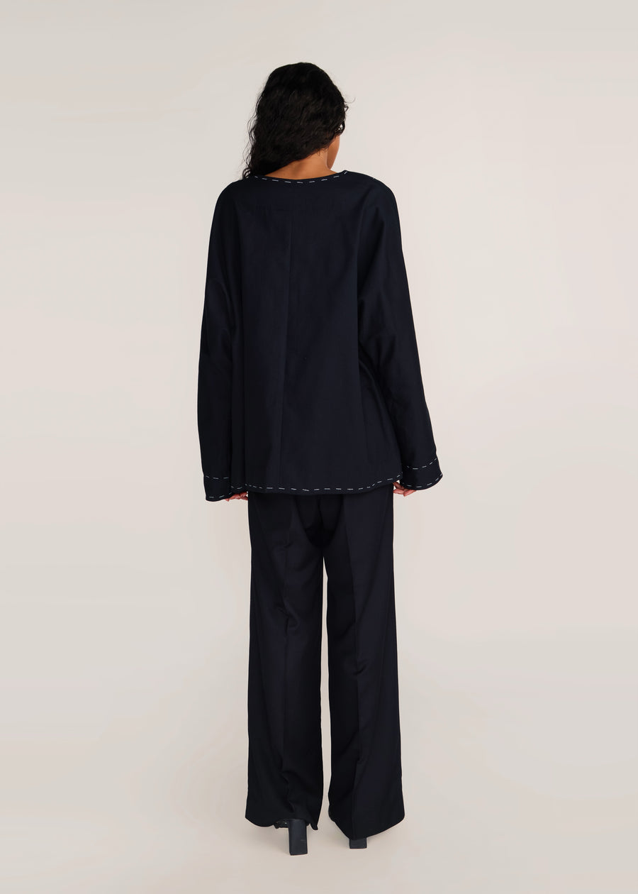 ROSANI The Cohors shacket in black - black cotton shacket with metallic botanical embroidery, back view
