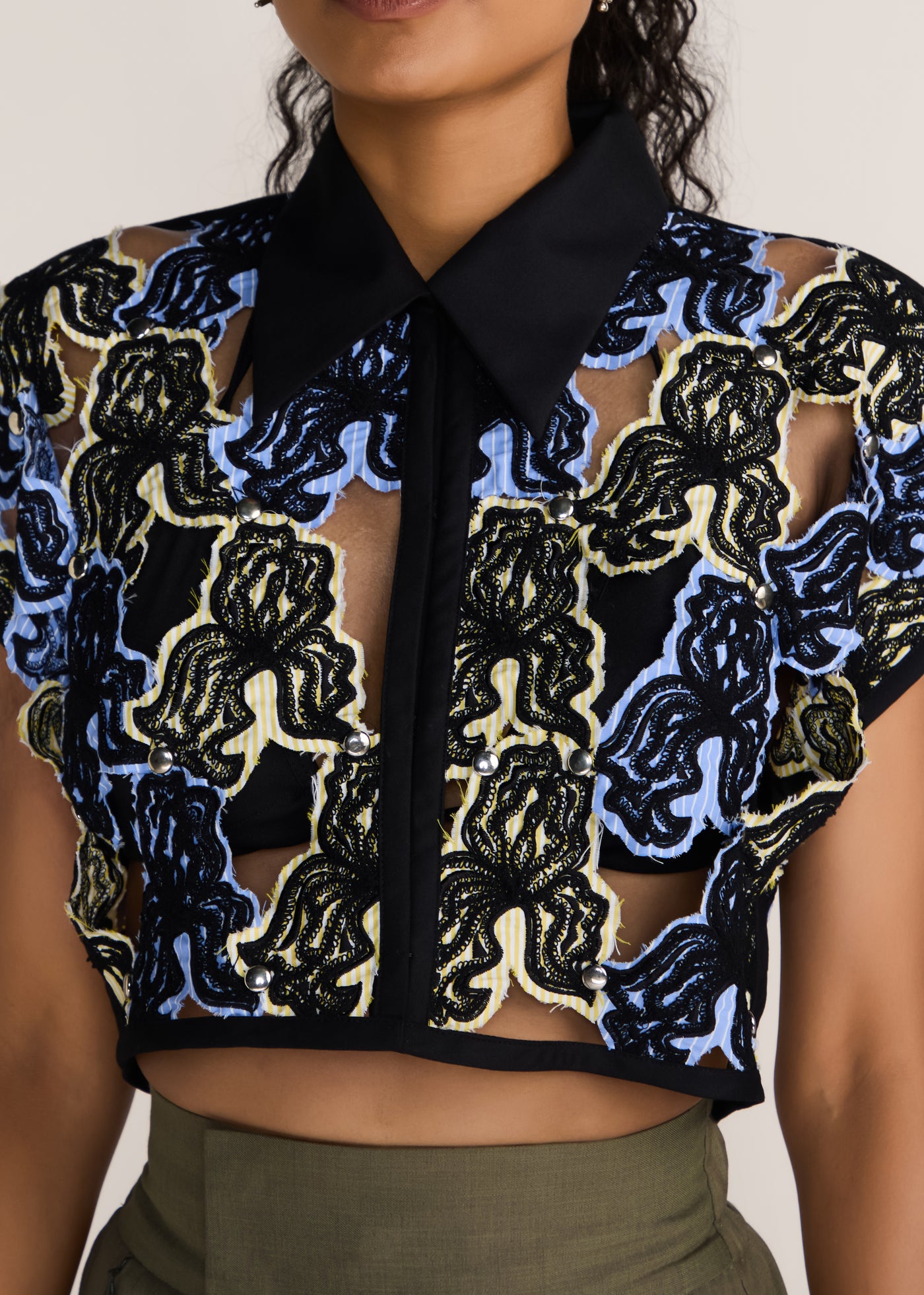 ROSANI The Compages top in multicolor - multicolor embroidered cutwork crop top with black panel finish, craft detail
