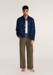 ROSANI The Concordia jacket in midnight denim - midnight denim eyelet jacket, front view