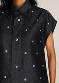 ROSANI The Converis shirt in charcoal - charcoal denim sleeveless shirt with metal flower embroidery, craft detail