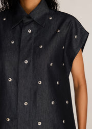 ROSANI The Converis shirt in charcoal - charcoal denim sleeveless shirt with metal flower embroidery, craft detail