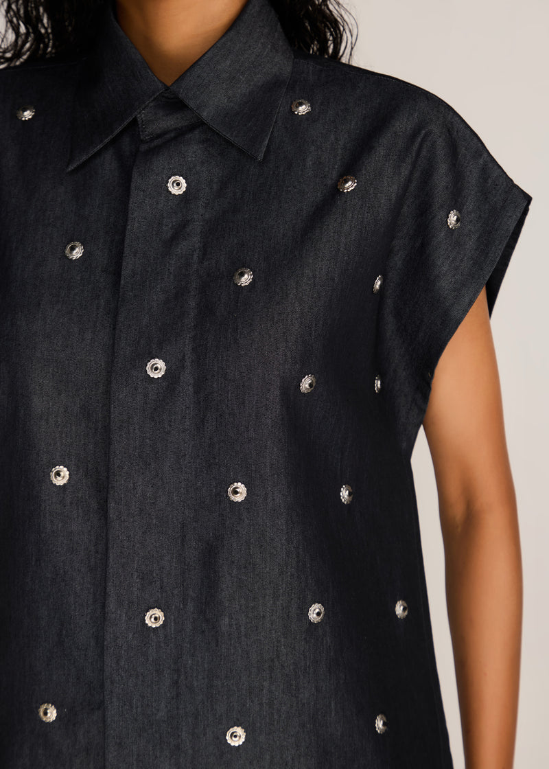 ROSANI The Converis shirt in charcoal - charcoal denim sleeveless shirt with metal flower embroidery, craft detail